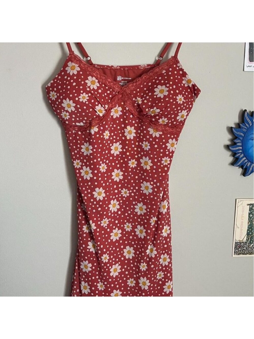 red floral daisy sun dress with adjustable straps.